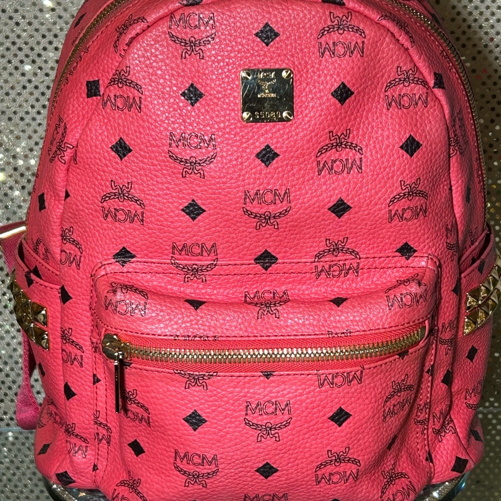 MCM Red Backpack with Gold Accents Approximately 14” x 12” x 5” Includes COA EUC